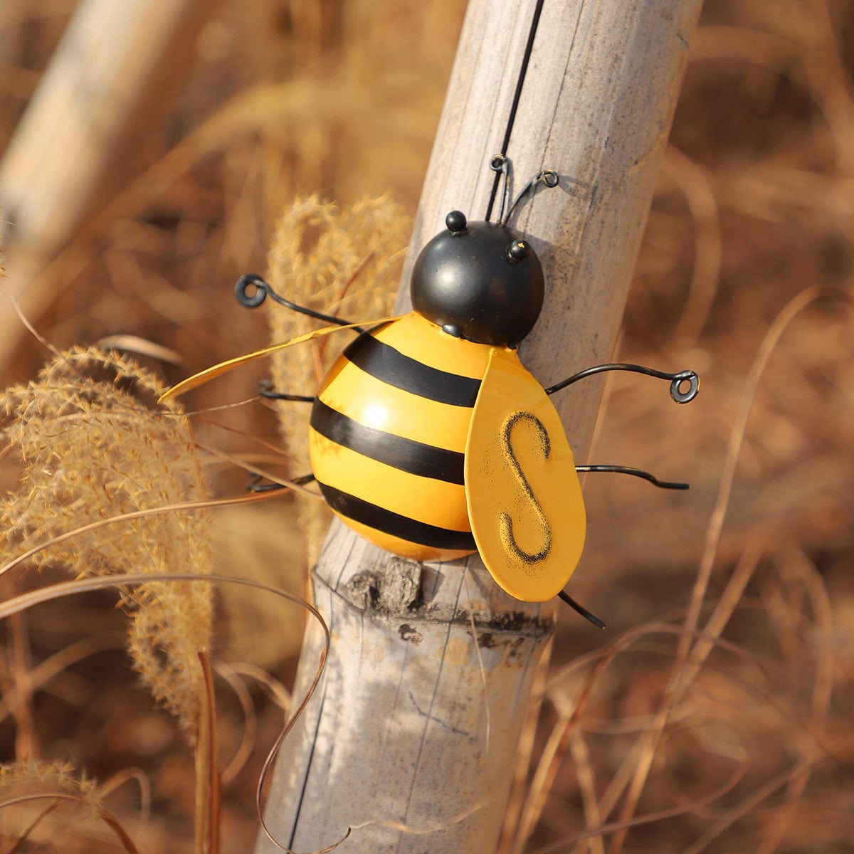 MorTime metal bee wall art invites admiration on porches, patios, and garden borders.