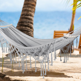 MOSFiATA outdoor hammock on patio or garden ideal for gatherings.
