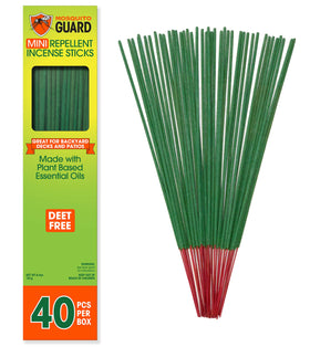 Mosquito Guard citronella sticks lit outdoors for a calmer, bug-free evening.