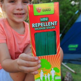 Mosquito Guard sticks arranged around a patio to form a protective perimeter.