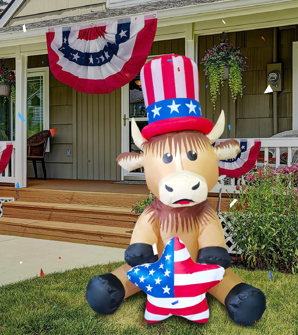Mowholm Highland cow holding American heart inflatable lights outdoor display