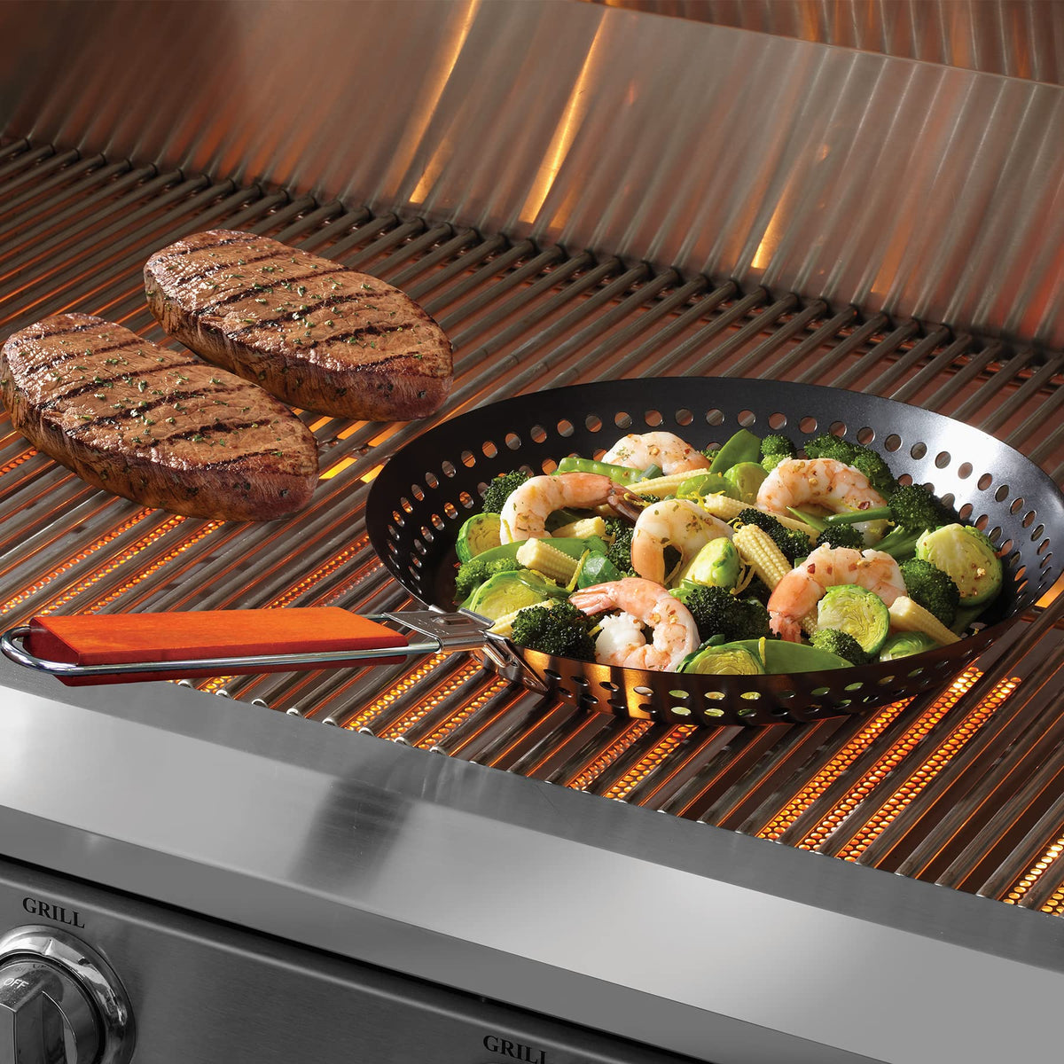 Mr. Bar-B-Q grill skillet ideal for vegetables and seafood on gas or charcoal grills.