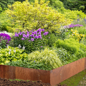 MTART flexible edging shaped into curves for creative garden design.