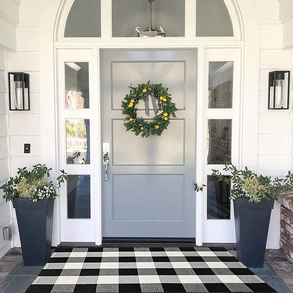 MUBIN cotton buffalo plaid rug at front door, durable and welcoming entryway.