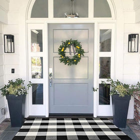 MUBIN cotton buffalo plaid rug at front door, durable and welcoming entryway.