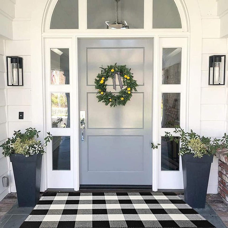 MUBIN cotton buffalo plaid rug at front door, durable and welcoming entryway.