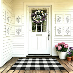 MUBIN buffalo plaid rug layered with HELLO mat to elevate curb appeal.
