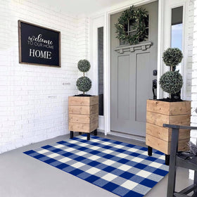 MUBIN hand-woven cotton rug enhances entryway layering with style