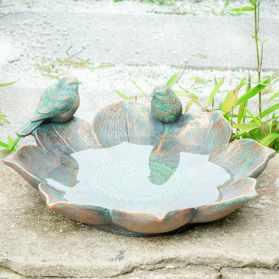 MUMTOP bird bath outdoors with flower-shaped bowl attracts garden birds and enhances yard color.