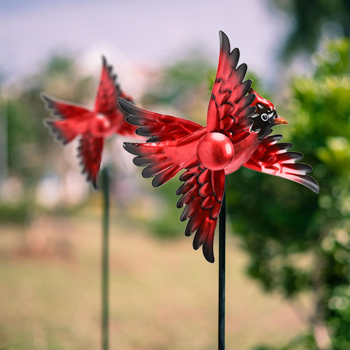 MUMTOP Cardinal Wind Spinner displayed at dusk enhances outdoor ambiance.