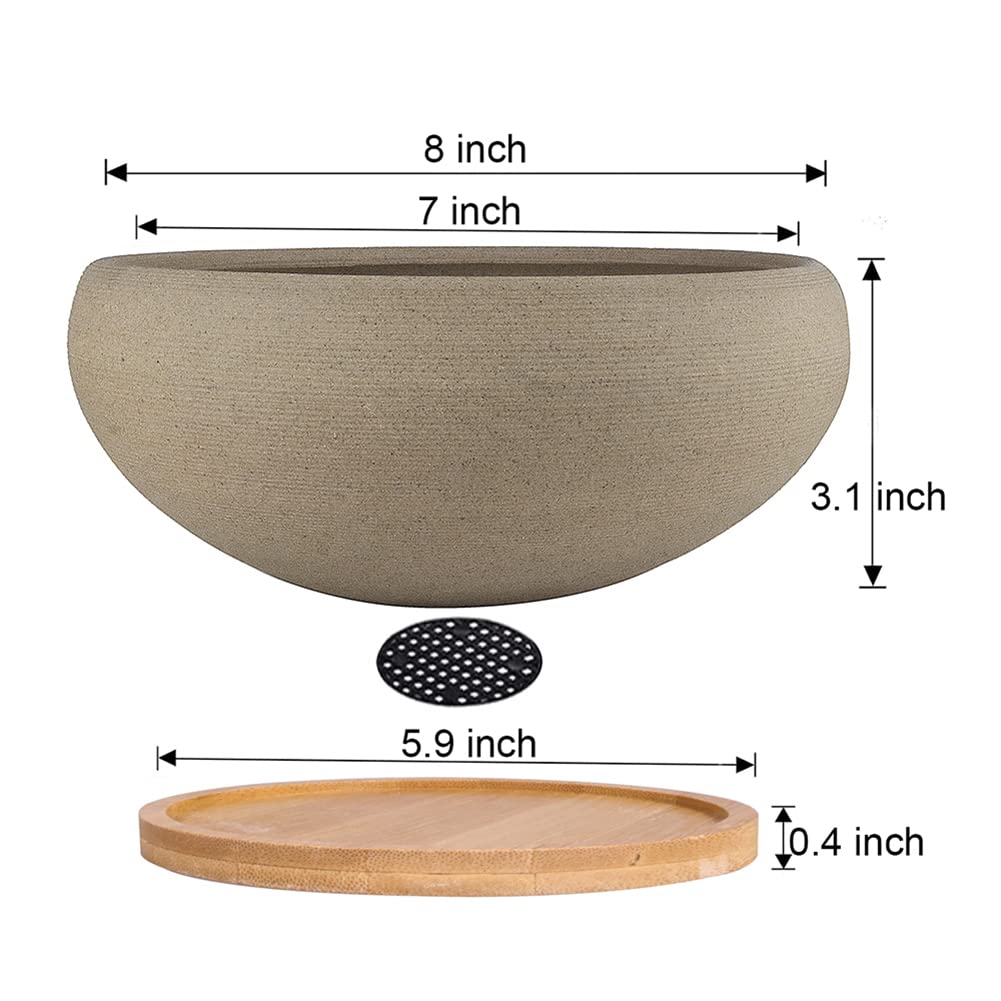 Muzhi bamboo tray supports the pot and catches drips for tidy spaces.