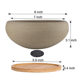 Muzhi bamboo tray supports the pot and catches drips for tidy spaces.