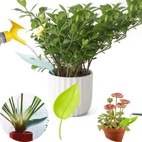 NADUSEP blue leaf watering funnel on a ceramic pot for easy watering
