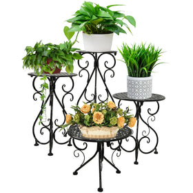 NAKUPE four-pack metal plant stand with varying heights for layered indoor decor.