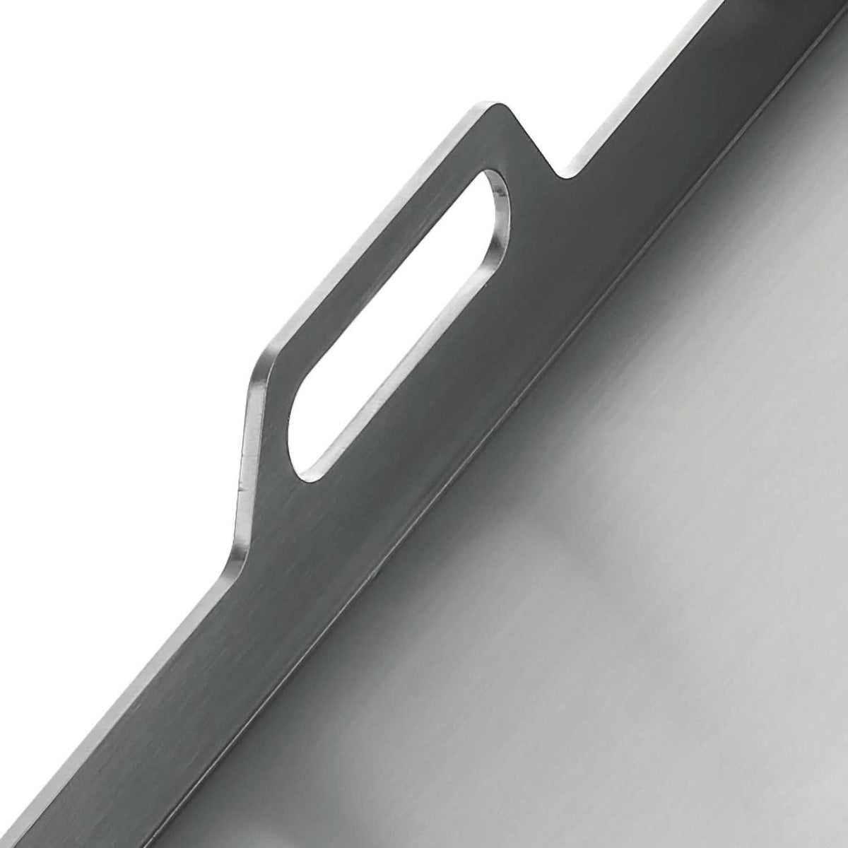 Napoleon griddle insert integrated grease traps keeps grill clean during cooking.