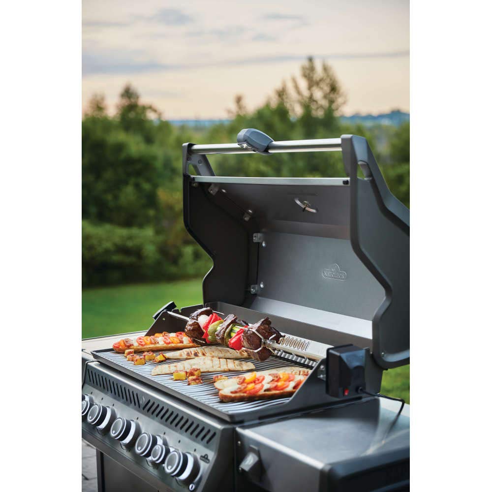 Napoleon Grill Light with adjustable clamp on a barbecue handle fits most grills.