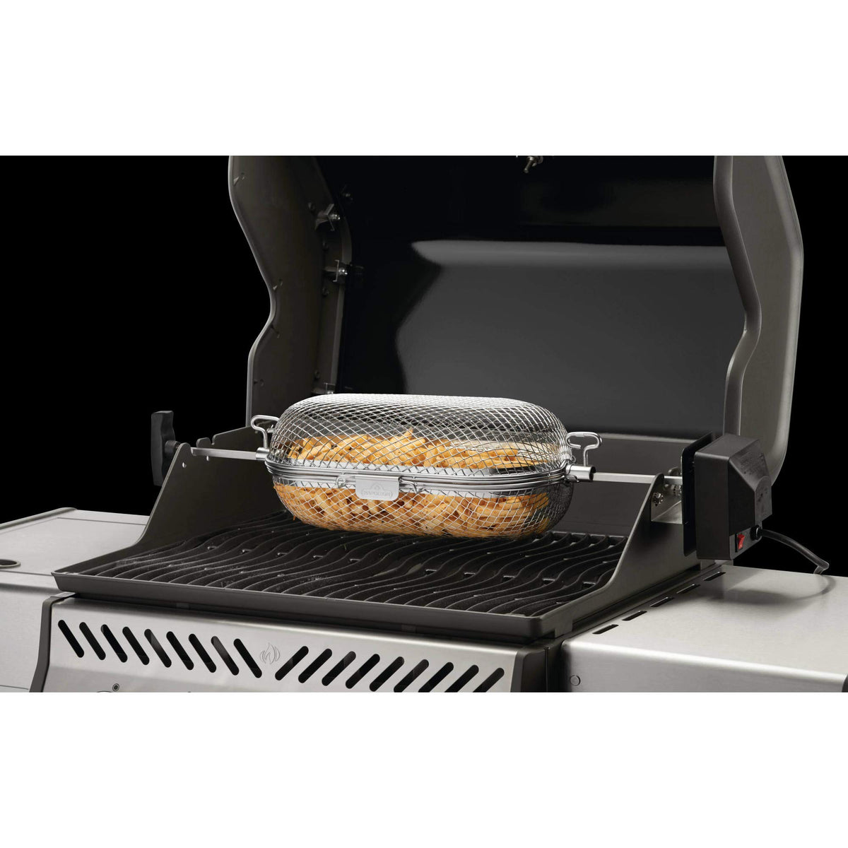 Napoleon rotisserie basket fries turning crispy on grill