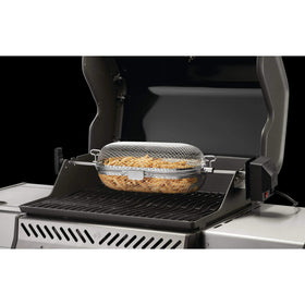 Napoleon rotisserie basket fries turning crispy on grill