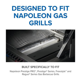Napoleon smoker box with wood chips creates aromatic smoke for meats.