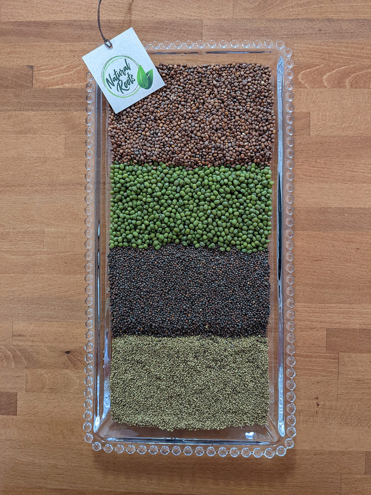 Natural Roots radish sprouts on a tray for spicy crunch.