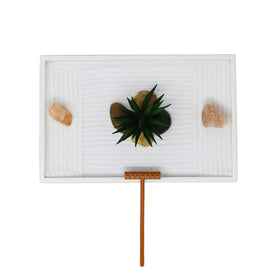 Nature's Mark white base provides clean contrast in a serene desk setup.