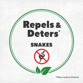 NatureStop snake deterrent spray along fence line protecting outdoor spaces