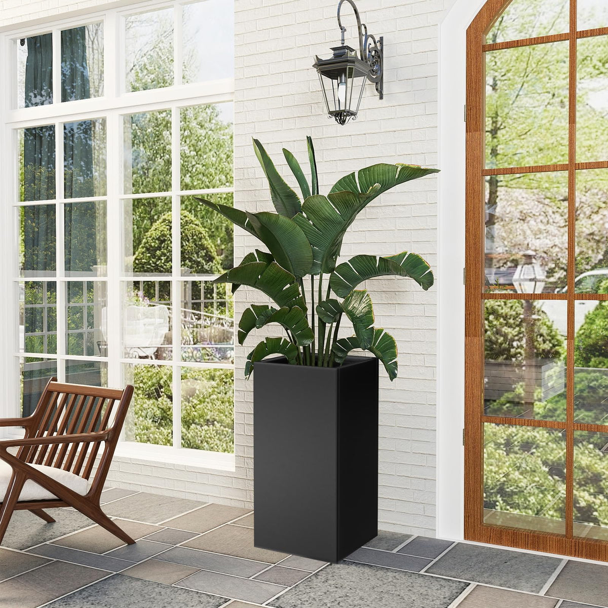 Nessxa tall metal planter box with modern design enhancing outdoor décor.