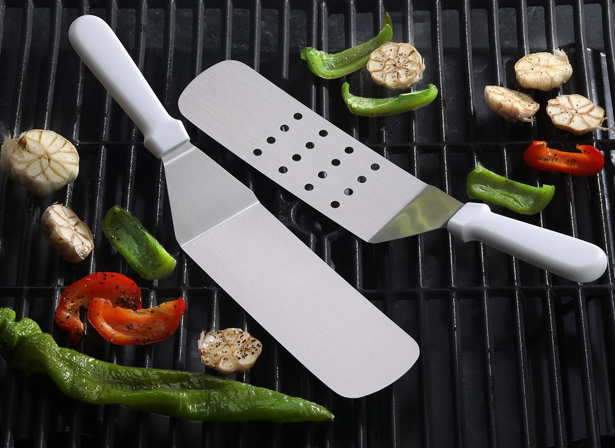 In-hand view of the 14.5-inch spatula for smooth flipping at the stove.