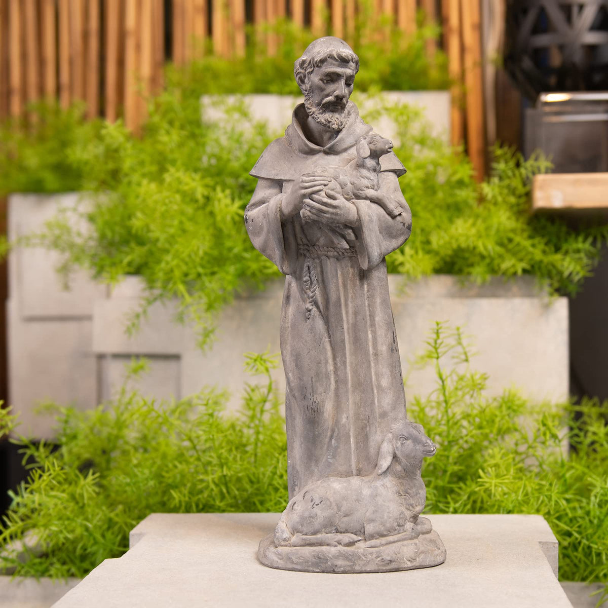 Newman House Studio Saint Francis resin sculpture, durable outdoor accent.