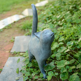 Newman House Studio cat figurine front view with verdigris finish enhances entryway charm.