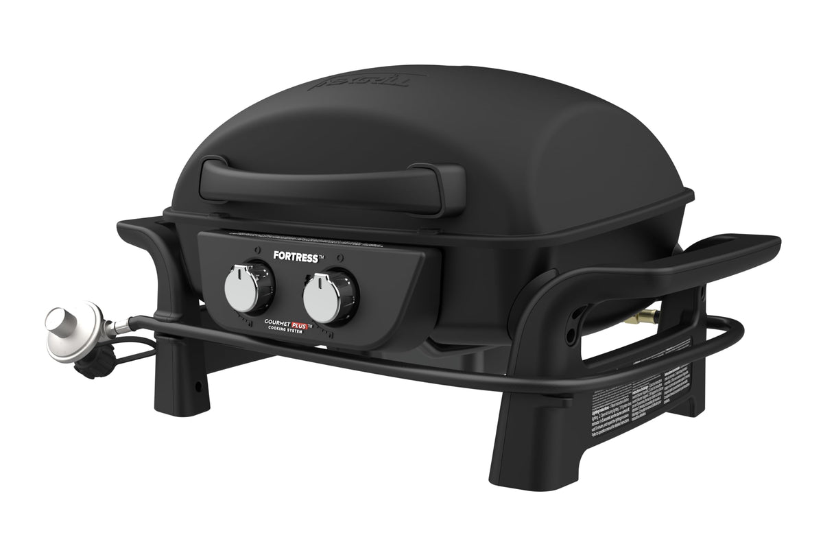 Nexgrill Fortress campsite grill with open lid for portable outdoor cooking.