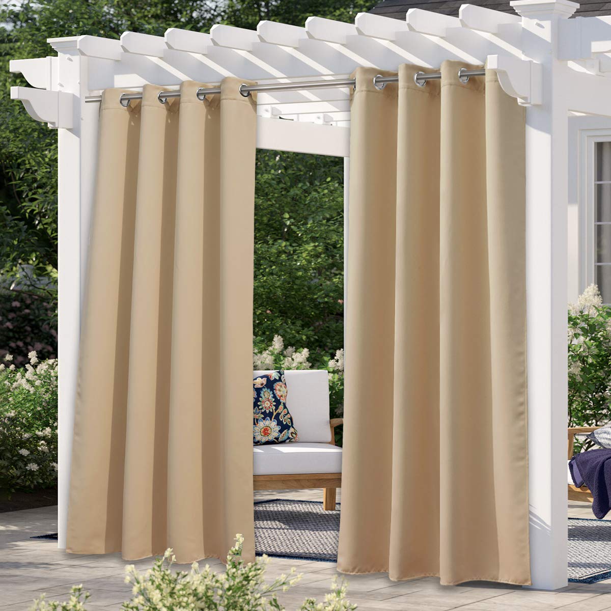 NICETOWN outdoor curtain on patio demonstrates waterproof 95in coverage for durable weather protection.