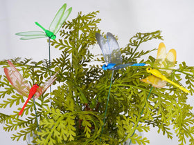 NiHome dragonfly stake black wings complements outdoor garden decor.