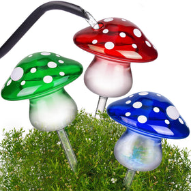 NiHome red mushroom glass bulb close-up for steady hydration of houseplants.