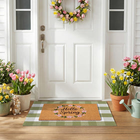 NIIKOOS green plaid layering rug creating the layered doormat look