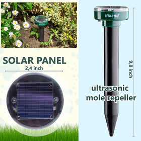 NIKAND Gopher Repellent Ultrasonic Solar Powered stake installed in yard for continuous deterrence.