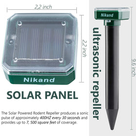NIKAND Solar Mole Repellent 4-pack placed along the backyard path for continuous protection