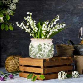 Ninehaoou ceramic pot for indoor or outdoor display year-round.