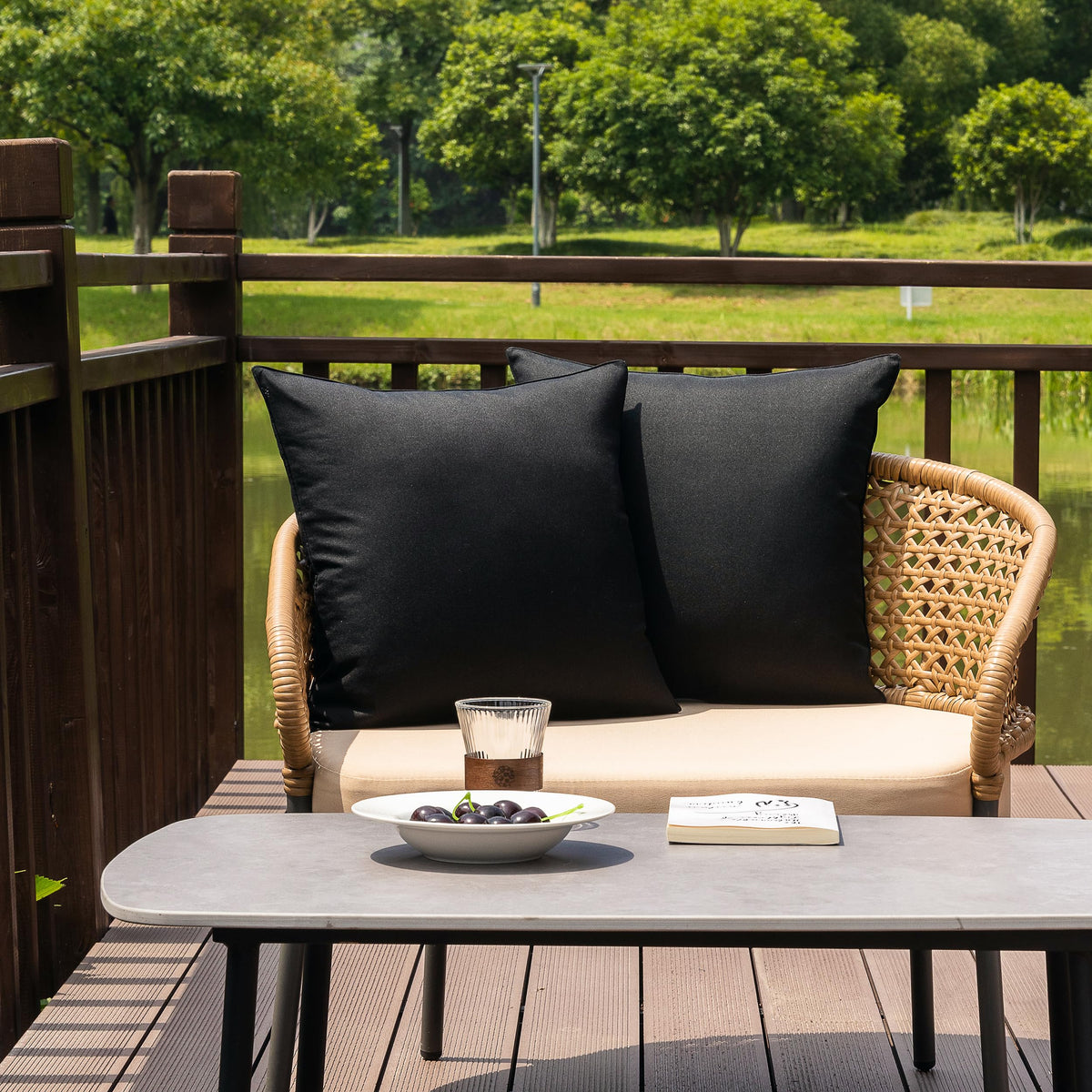 NiNi ALL outdoor pillow cover in black, back view, weather-ready for patios.