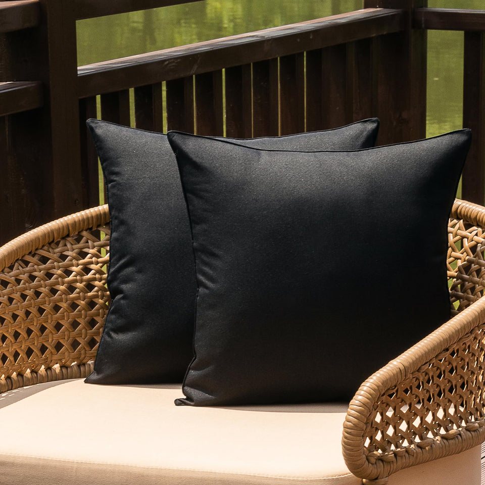 NiNi ALL outdoor pillow cover in black, front view, ideal for garden seating.