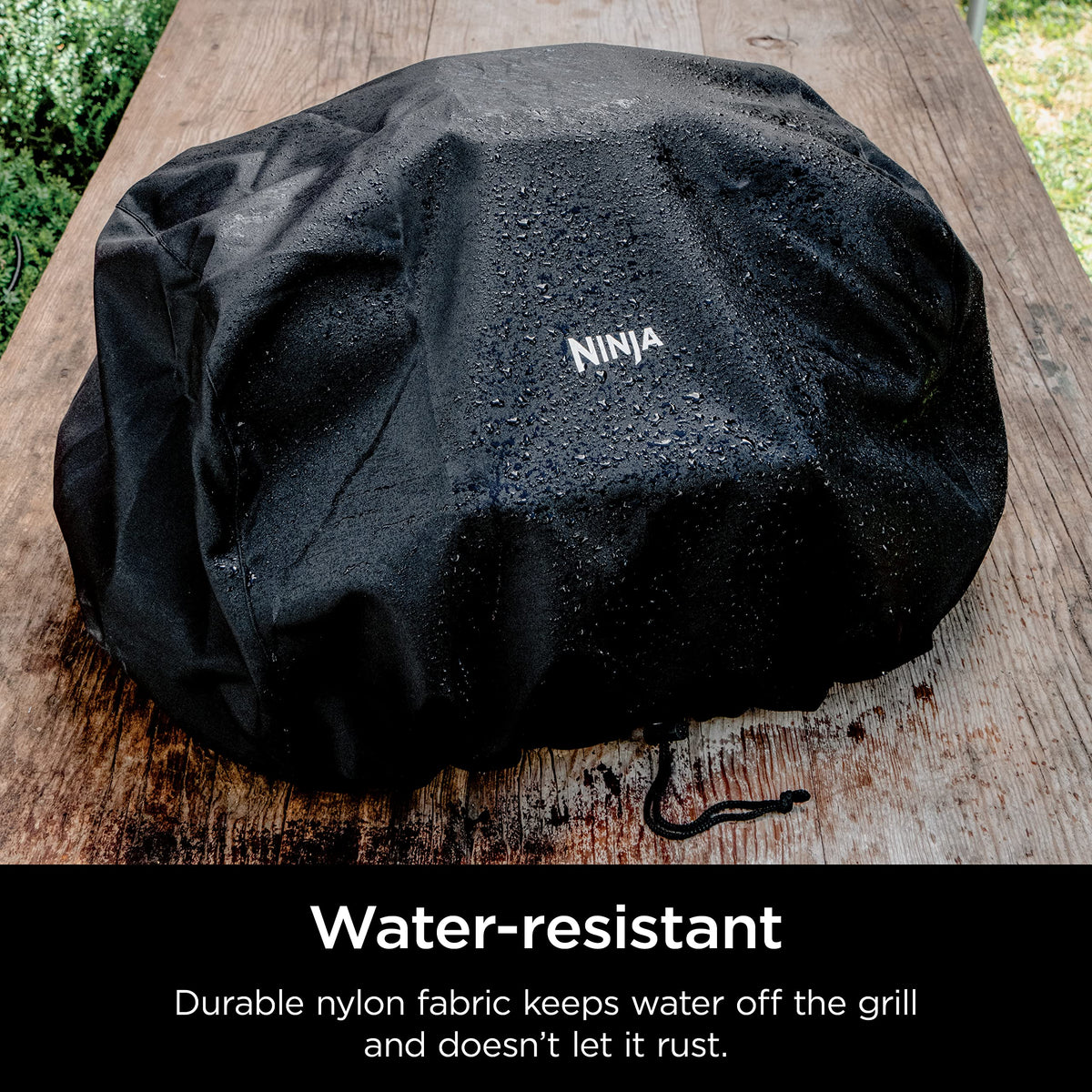 Ninja Woodfire Premium Outdoor Cover anti-fade fabric blocks sun without fading.