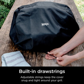 Ninja Woodfire Premium Outdoor Cover with drawstrings and elastic sides stays put.