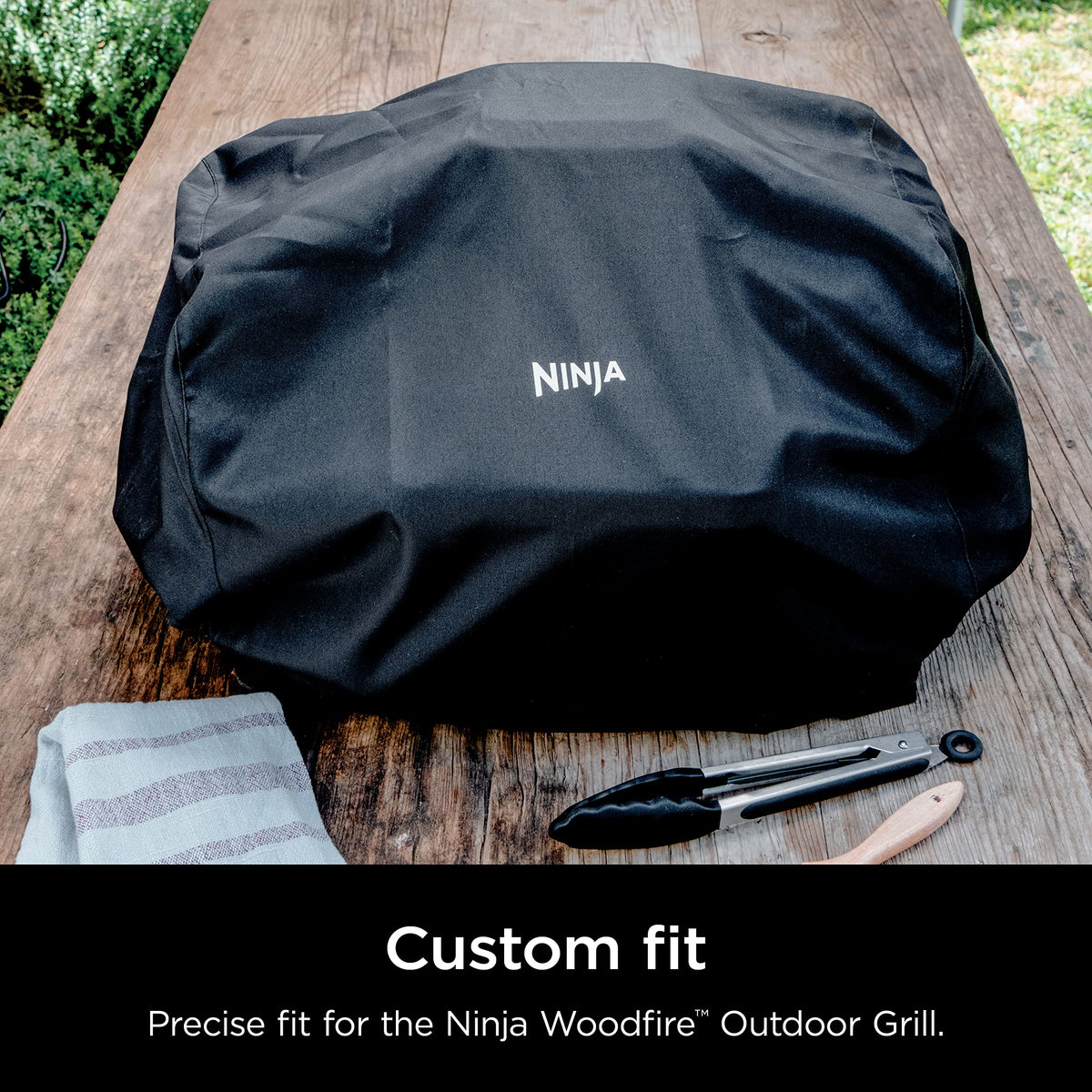 Ninja Woodfire Premium Cover water-resistant material keeps the grill shielded from rain.