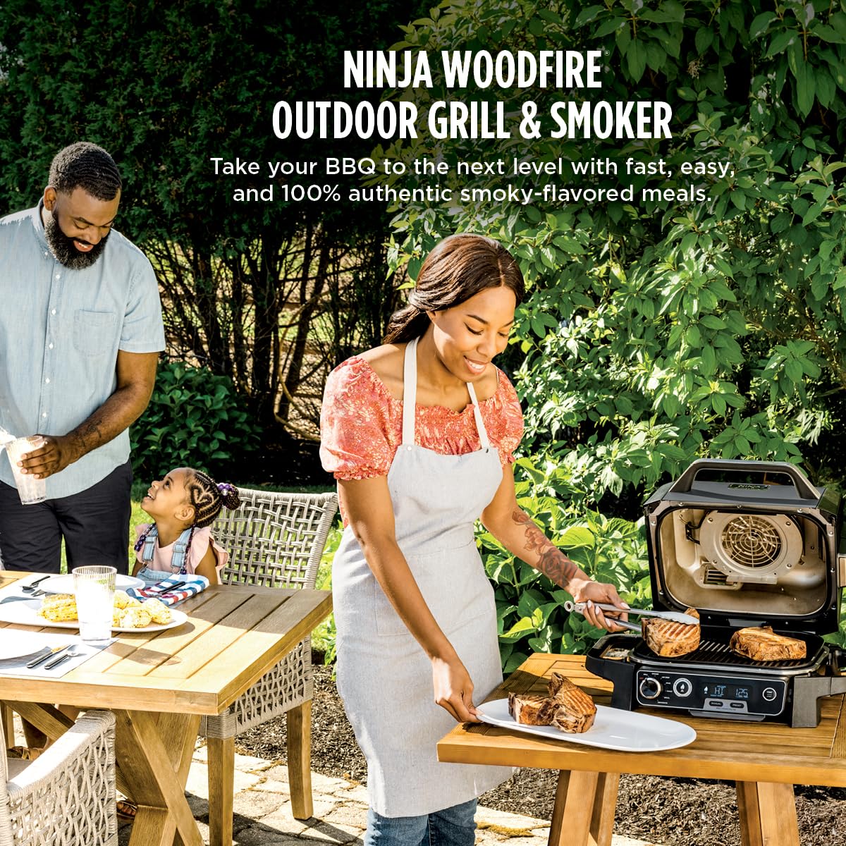 Ninja Woodfire Pro grill with lid open showing 141-square-inch nonstick grate for easy searing