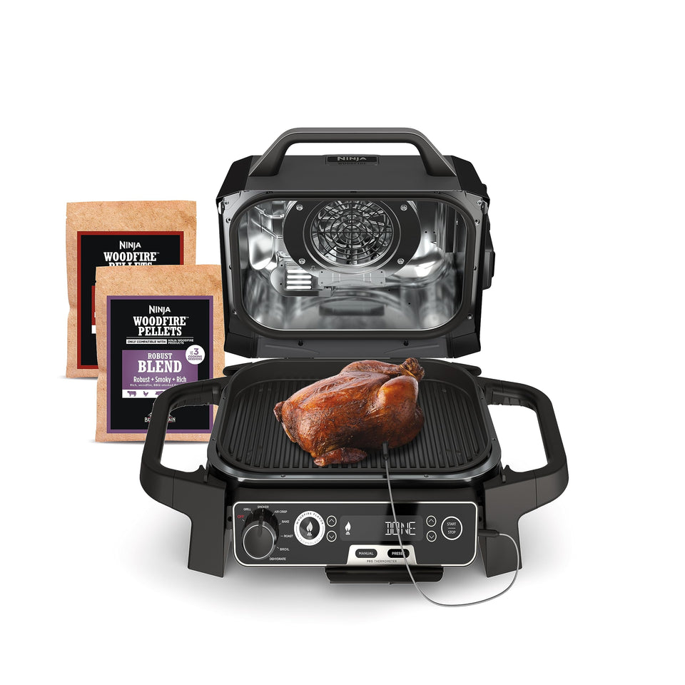 Ninja Woodfire Pro outdoor grill front view with weather-ready design for versatile cooking