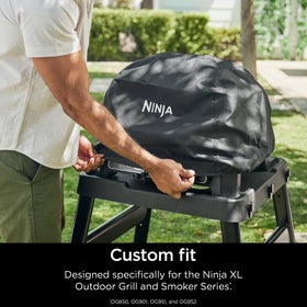 Ninja Woodfire XL Premium Grill Cover Pro with elastic drawstrings for a snug, secure fit on the grill.