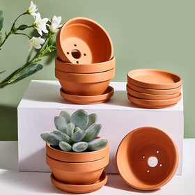 NiSevenLiving pots on a sunny balcony show versatile indoor-outdoor use.