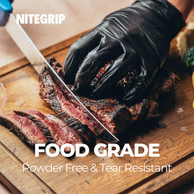 Person wearing Nite Grip gloves while grilling for control