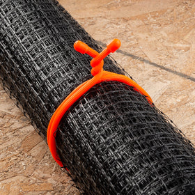 The reusable Gear Tie helps reduce waste from disposable ties.