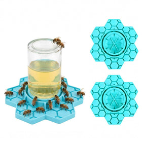 NIZEFEI bee watering station attached to a blue Mason jar for steady hydration